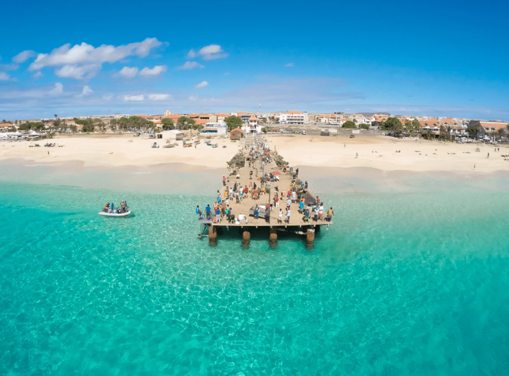 Aerial view of the pier and beach of Santa Maria, with turquoise sea, Sal Island